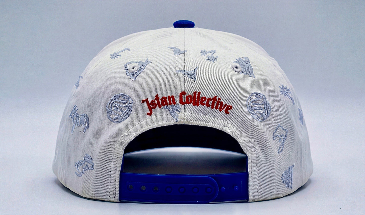 White and blue cap with various designs and text on a light gray background