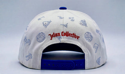White and blue cap with various designs and text on a light gray background