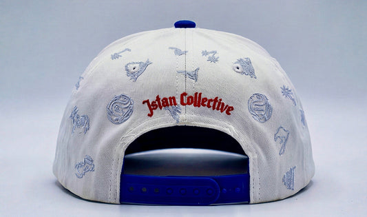 White and blue cap with various designs and text on a light gray background